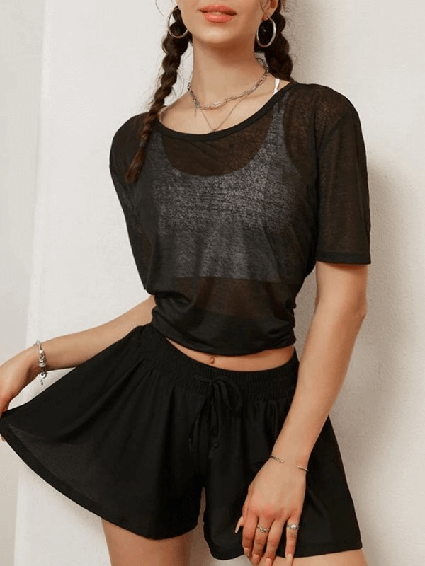 Stylish translucent women's top with open-back tie, short sleeves, perfect for yoga. Lightweight, quick-dry fabric in black.